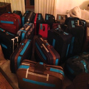 Almost all of the 20 suitcases. Oh hey, teal tape!
